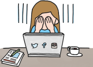 A woman crying in front of a laptop frustrated